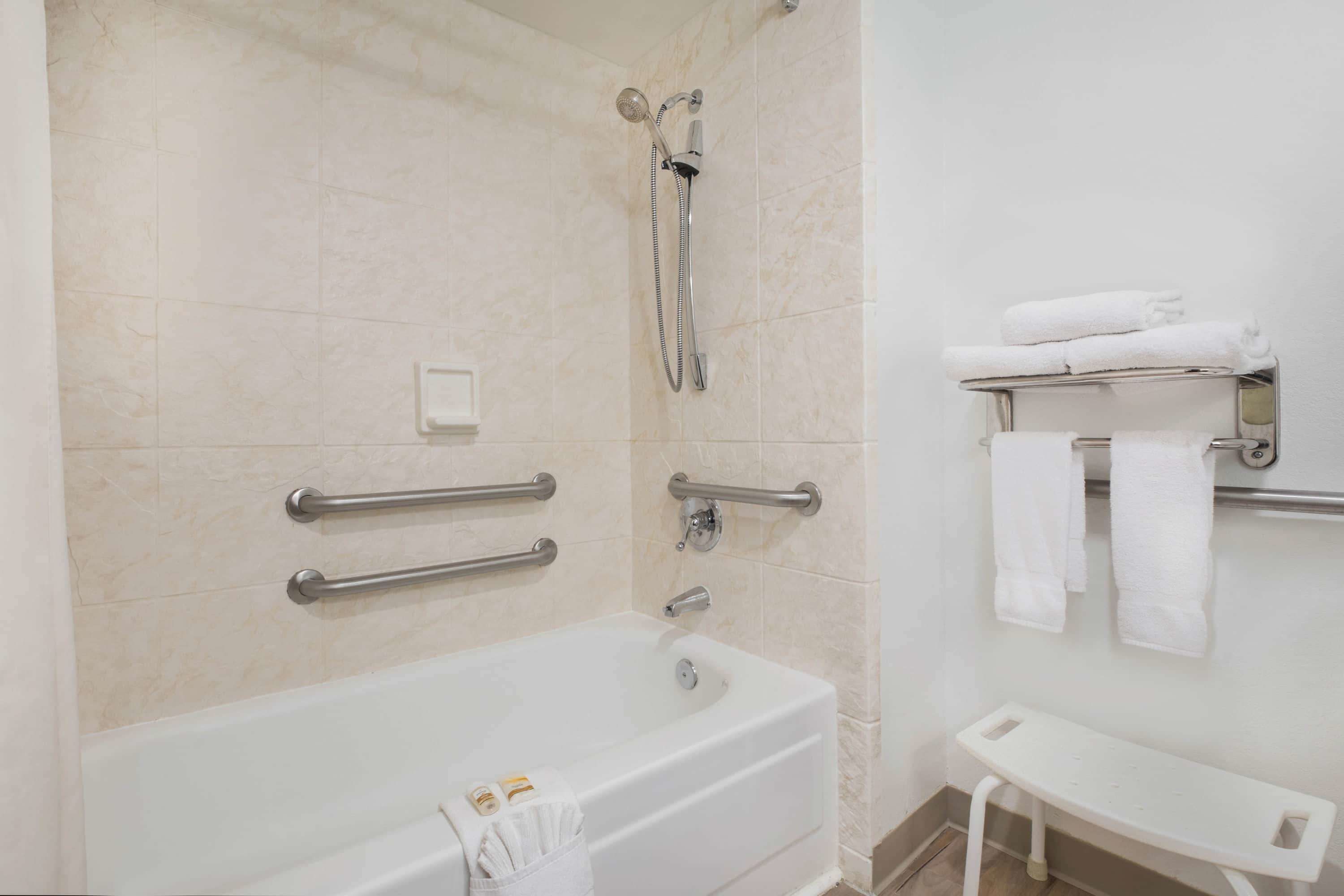 room, 1 queen bed, accessible, non smoking (mobility accessible) | bathroom | combined shower/bathtub, eco-friendly toiletries, hair dryer, towels