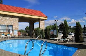 Seasonal outdoor pool, pool umbrellas, pool loungers