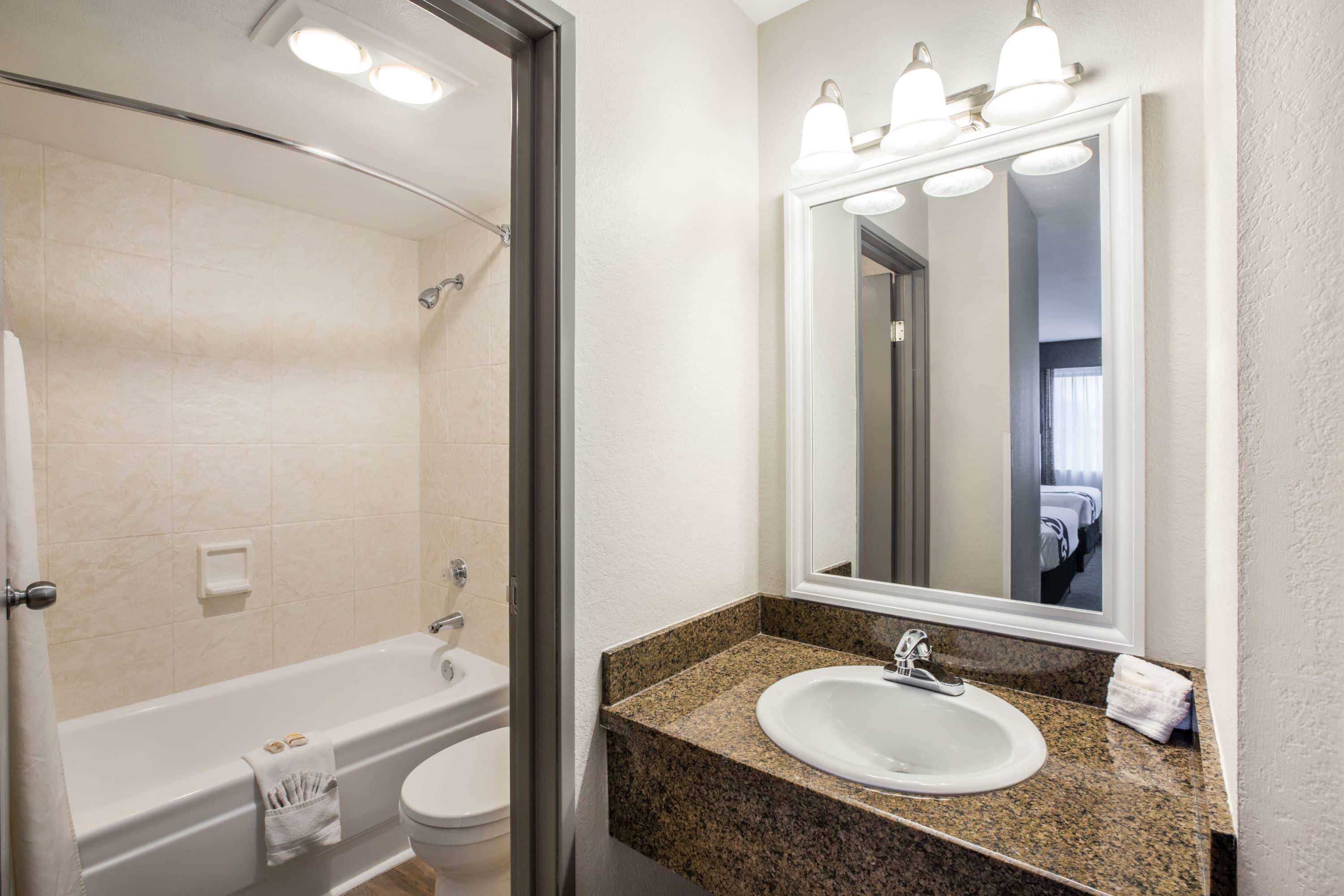 combined shower/bathtub, eco-friendly toiletries, hair dryer, towels