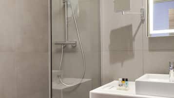 Eco-friendly toiletries, hair dryer, towels