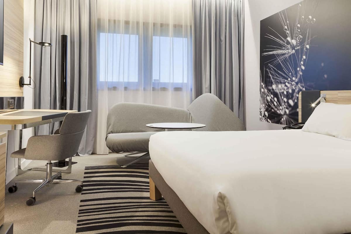 Premium bedding, memory-foam beds, in-room safe, desk