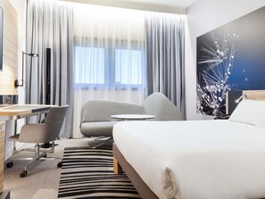 Premium bedding, memory-foam beds, in-room safe, desk