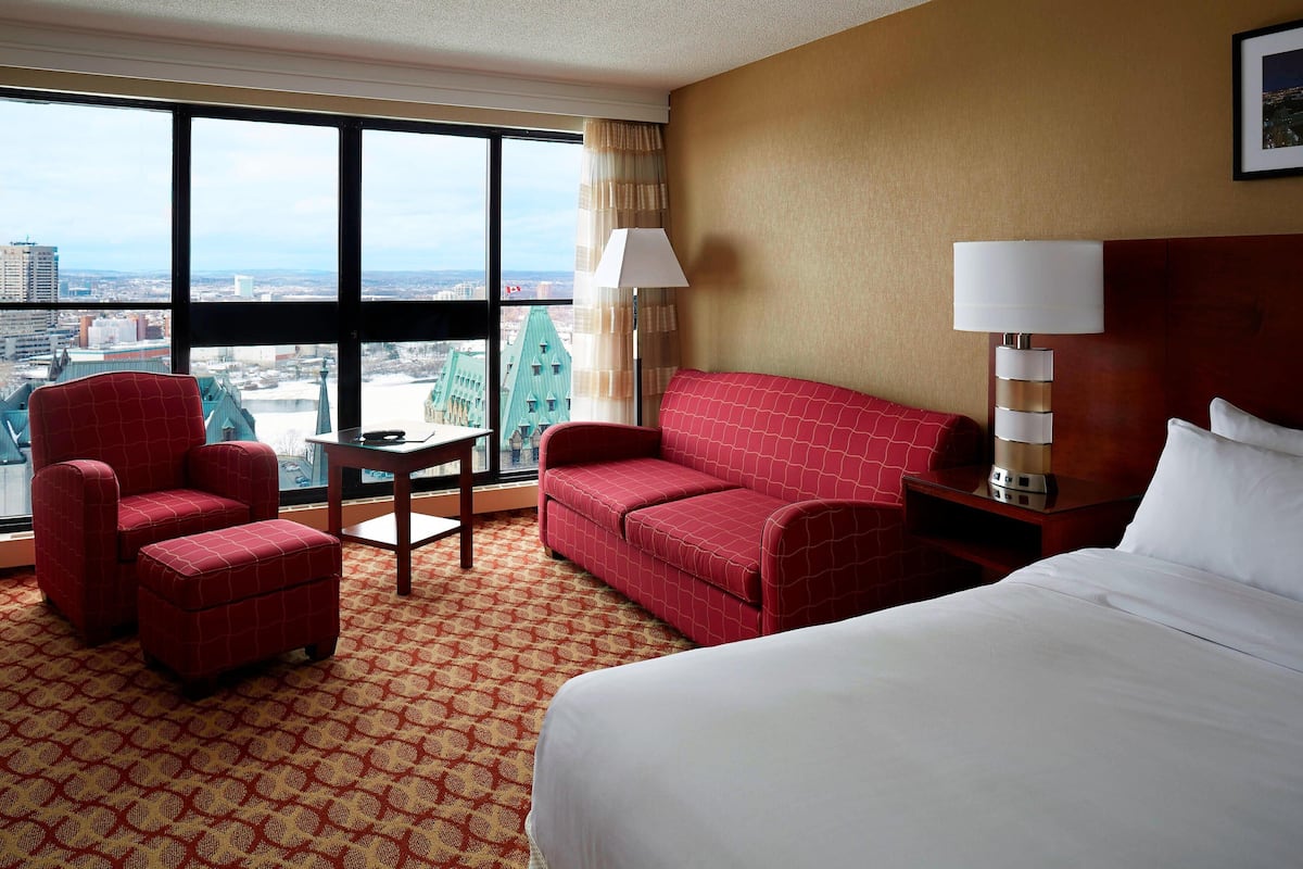 Deluxe Room, 1 King Bed with Sofa bed | Premium bedding, in-room safe, desk, laptop workspace