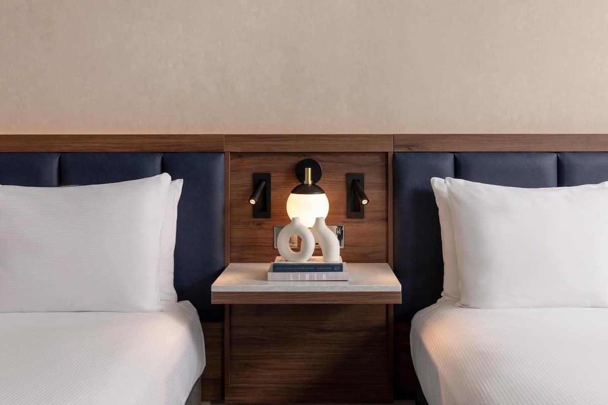 Premium Room, 2 Queen Beds | Hypo-allergenic bedding, in-room safe, desk, laptop workspace