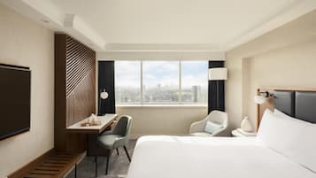 Habitación Deluxe, 1 cama King size, vista a la ciudad | Ropa de cama hipoalergénica y caja de seguridad en la habitación