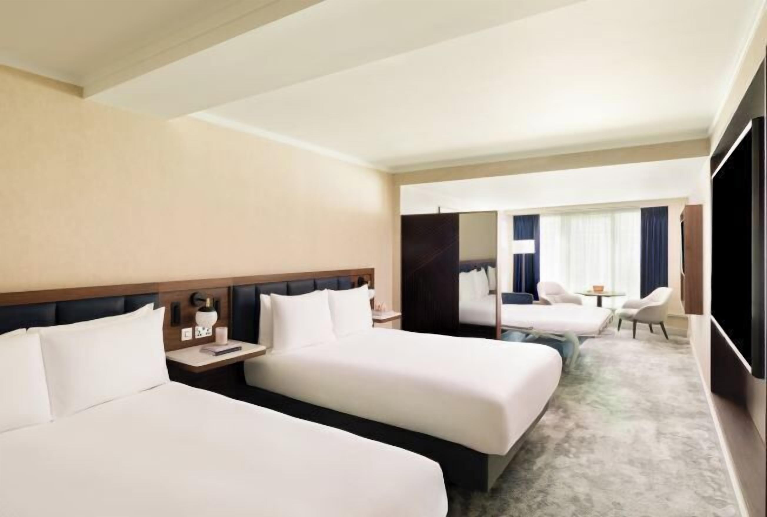 Hypo-allergenic bedding, in-room safe, desk, laptop workspace