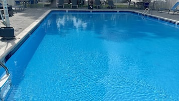 Seasonal outdoor pool, pool loungers