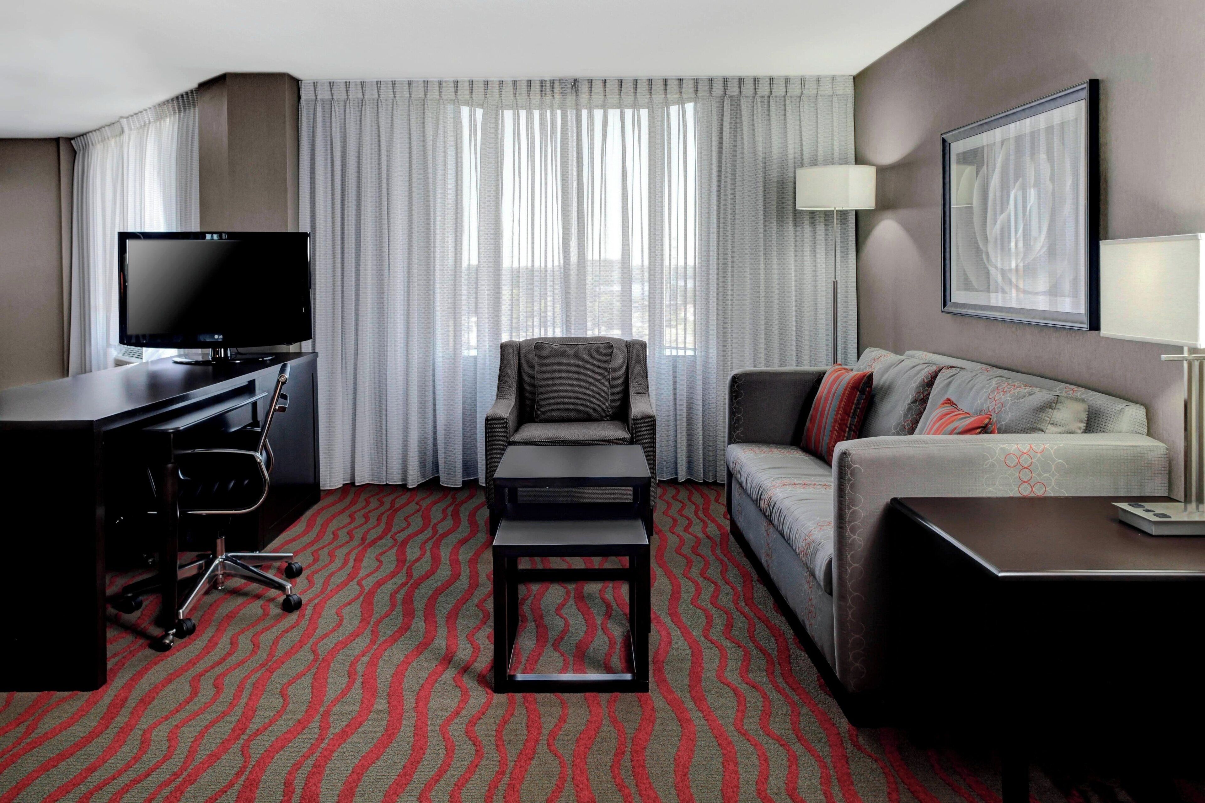 room, 1 king bed with sofa bed, non smoking | living area | 32-inch lcd tv with cable channels, tv