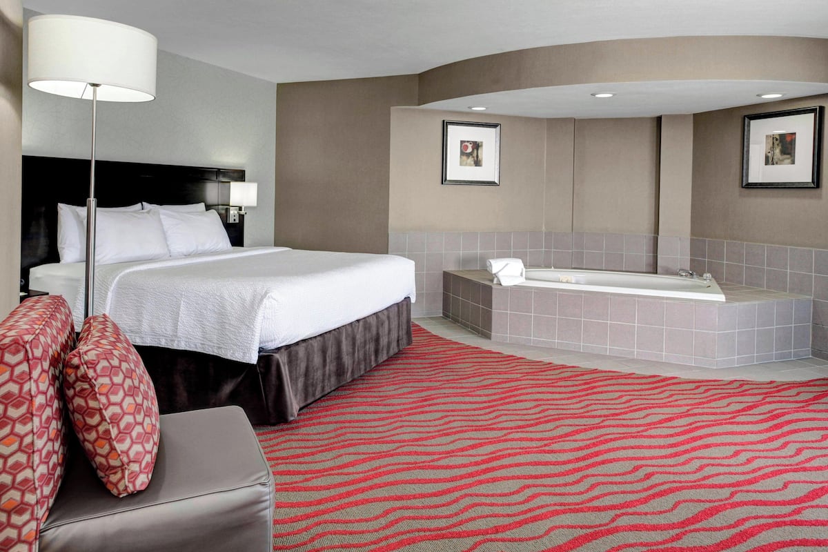 Room, 1 King Bed with Sofa bed, Non Smoking | Pool | Indoor pool
