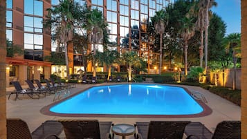 Outdoor pool, open 7:00 AM to 10:00 PM, sun loungers