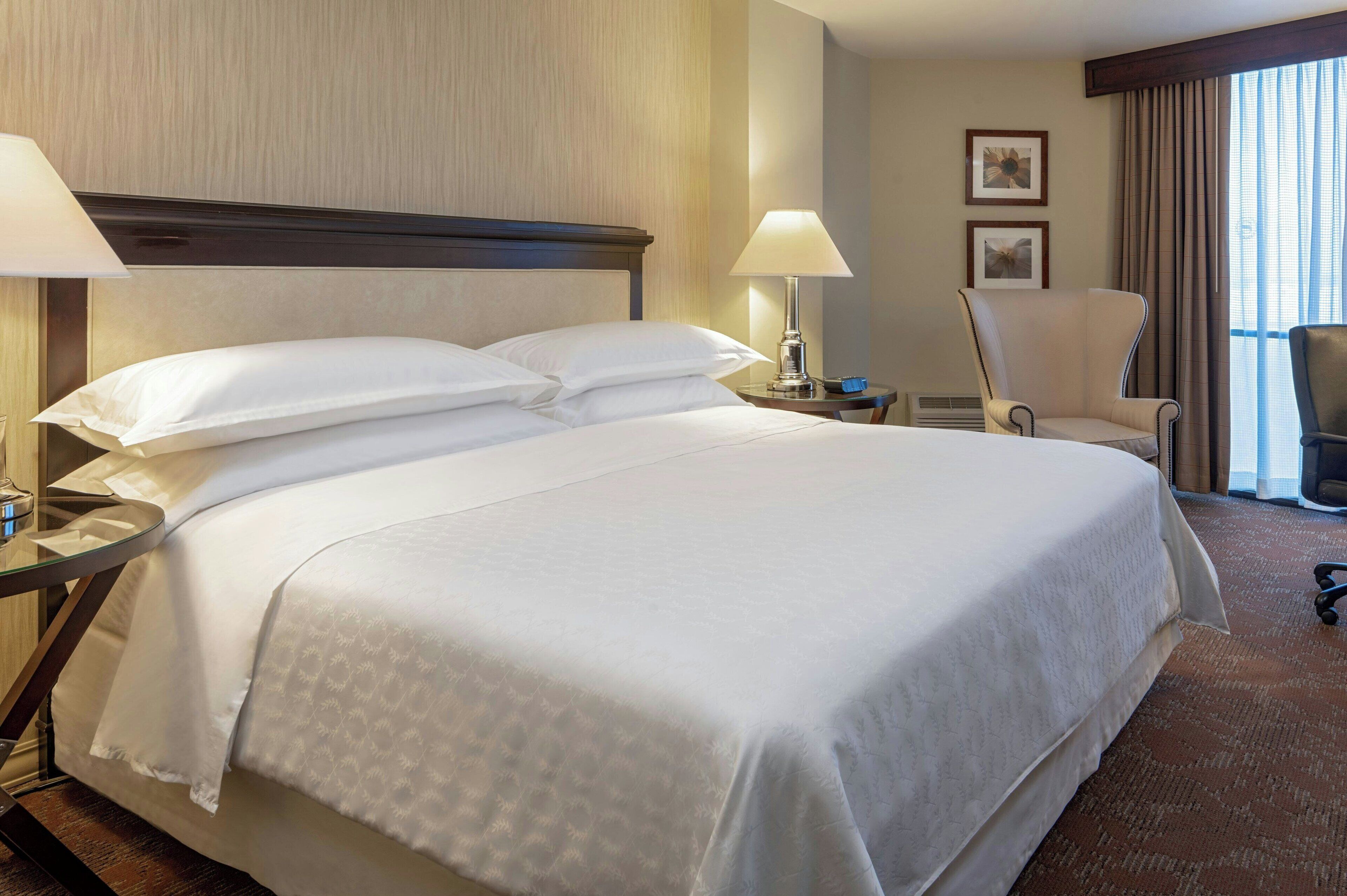 Premium bedding, down comforters, pillowtop beds, in-room safe