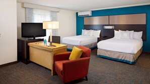A hotel room with a desk, two beds, a TV, and a chair. - Residence Inn by Marriott Cherry Hill Philadelphia (Cherry Hill)