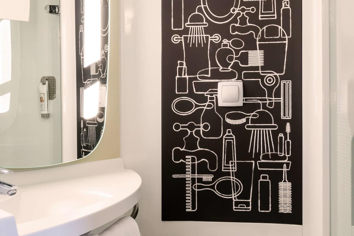 eco-friendly toiletries, hair dryer, towels