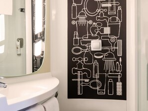 Eco-friendly toiletries, hair dryer, towels