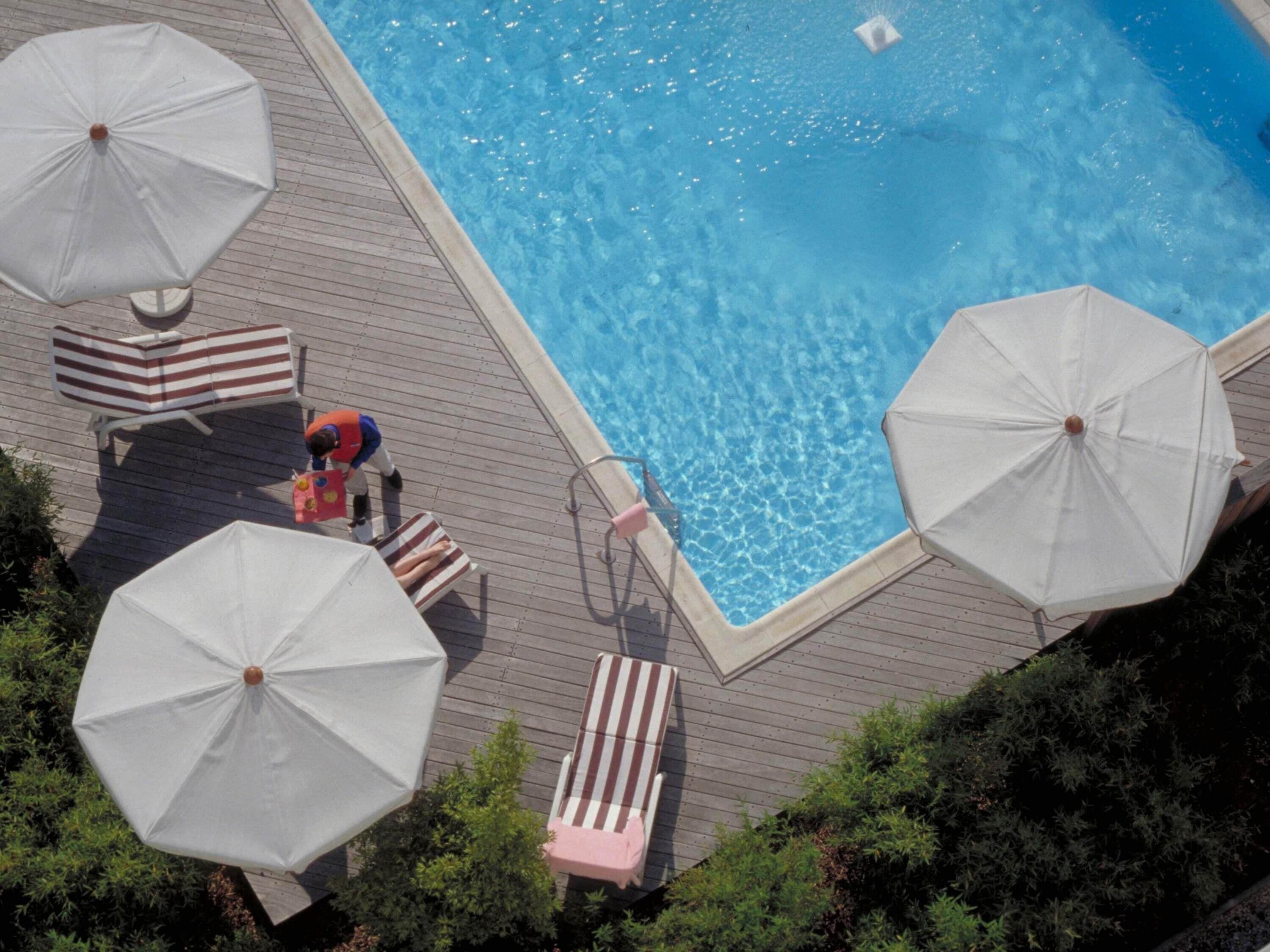 Seasonal outdoor pool, open 10:00 AM to 10:00 PM, sun loungers