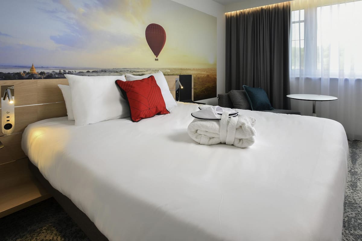 Roba de llit d'alta qualitat i caixa forta a l'habitació