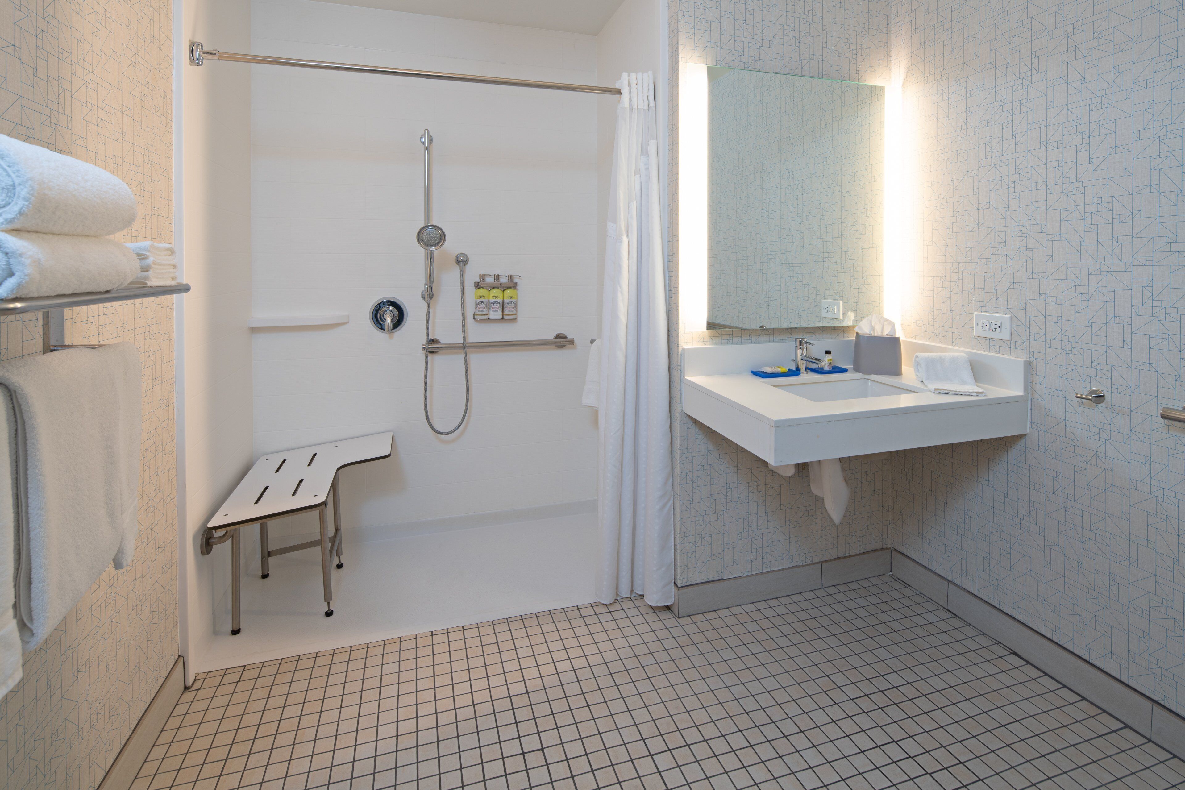 suite, 1 king bed, roll-in shower (roll-in shower) | 1 bedroom, in-room safe, desk, laptop workspace