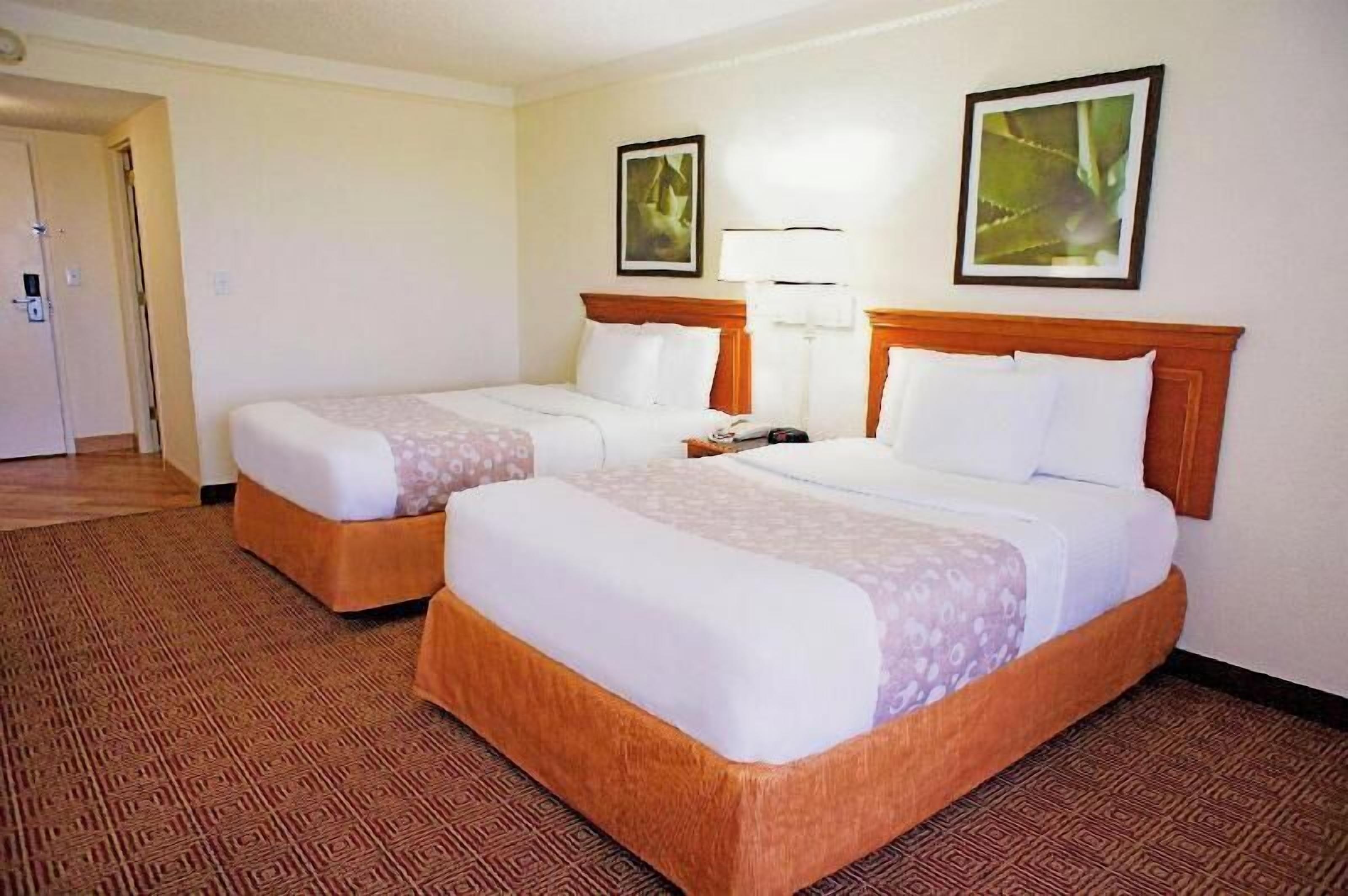 Pillowtop beds, desk, laptop workspace, blackout drapes