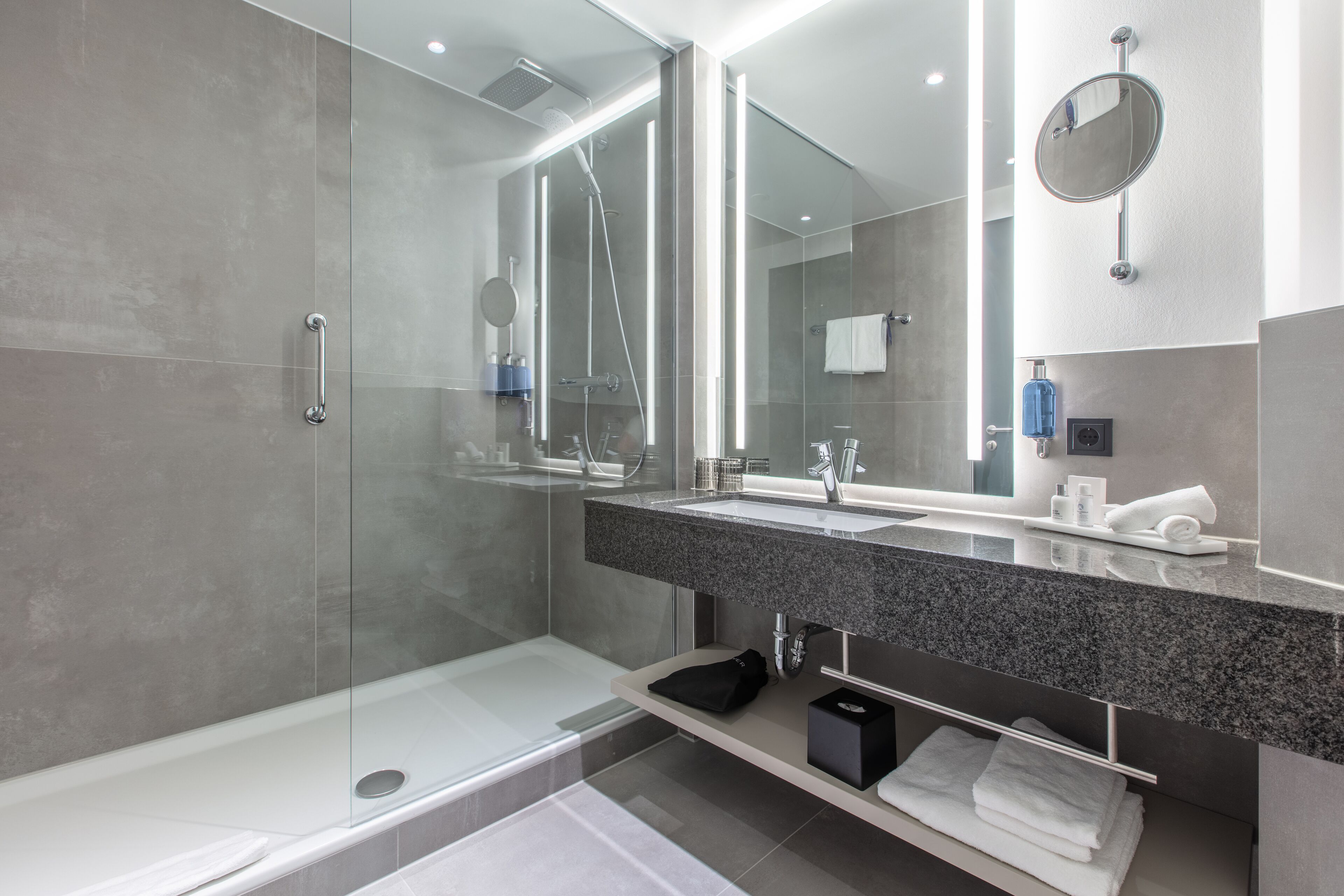 shower, eco-friendly toiletries, hair dryer, towels