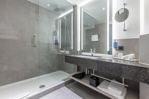 Shower, eco-friendly toiletries, hair dryer, towels