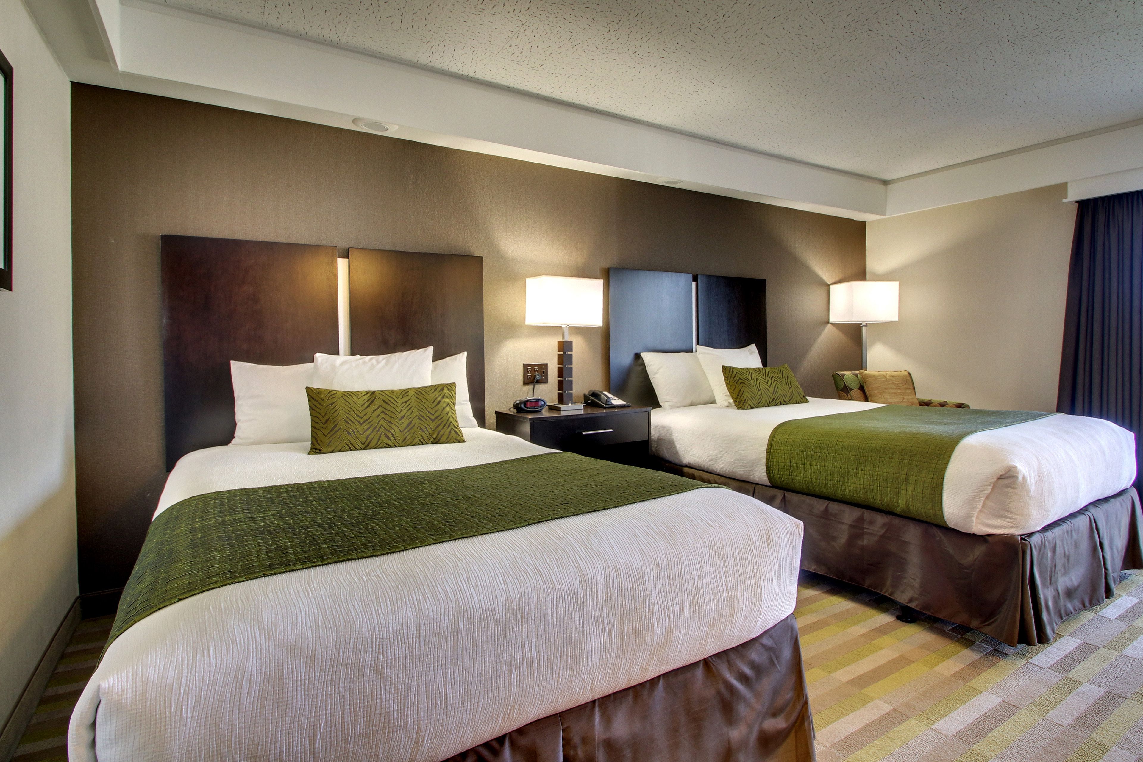 standard room, 2 double beds, patio, pool view | in-room safe, laptop workspace, blackout curtains, iron/ironing board