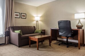 Desk, laptop workspace, blackout drapes, iron/ironing board