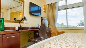 Premium bedding, down comforters, minibar, in-room safe