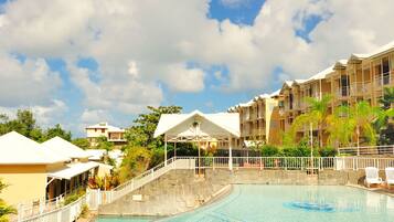 Outdoor pool, pool umbrellas, pool loungers