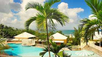 Outdoor pool, pool umbrellas, sun loungers