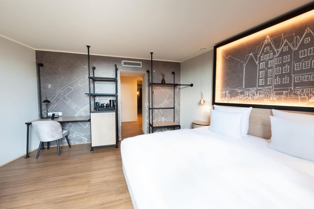 Junior Suite, 1 King Bed (Aqua) | Living area | 55-inch Smart TV with digital channels, TV