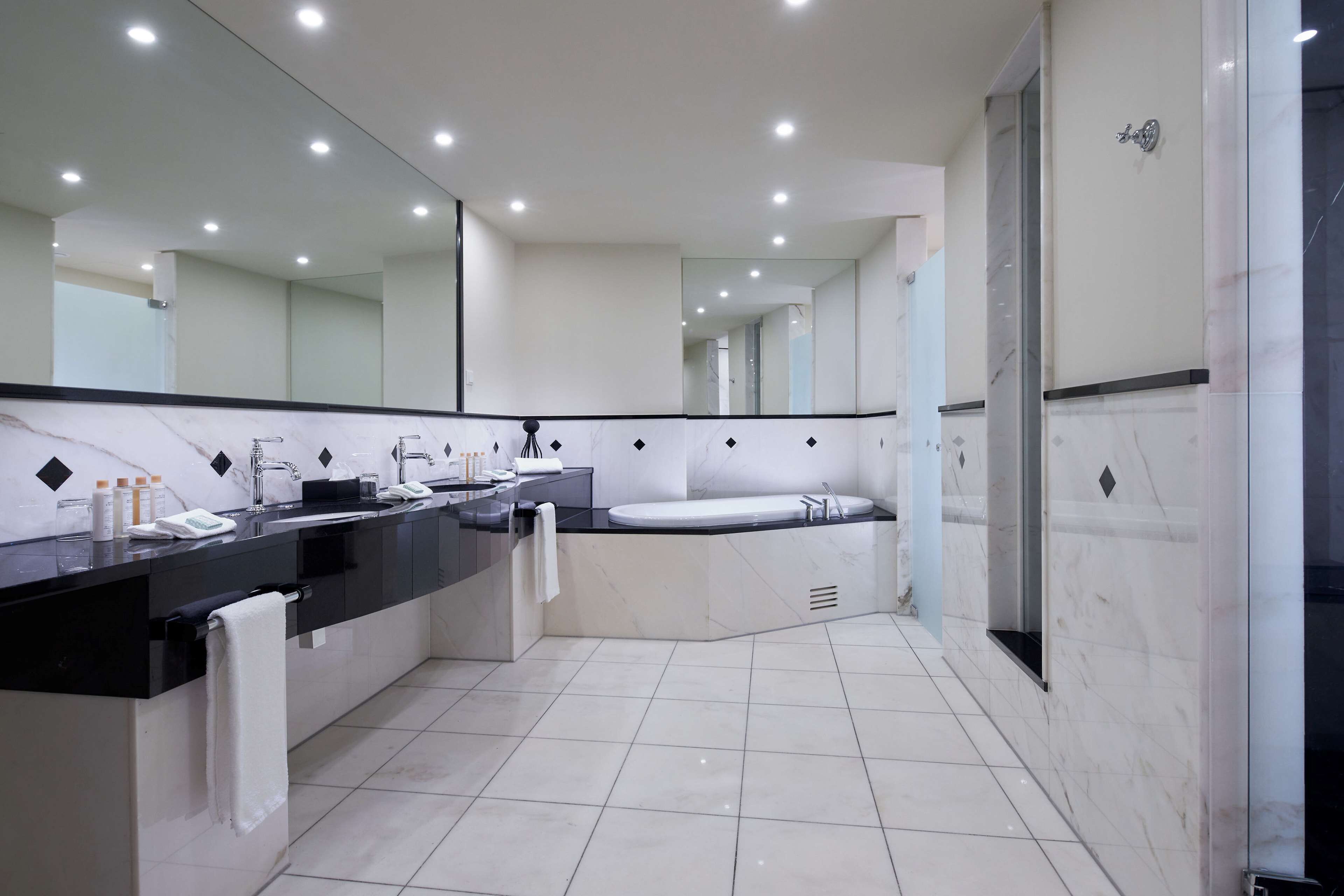 eco-friendly toiletries, hair dryer, bathrobes, towels