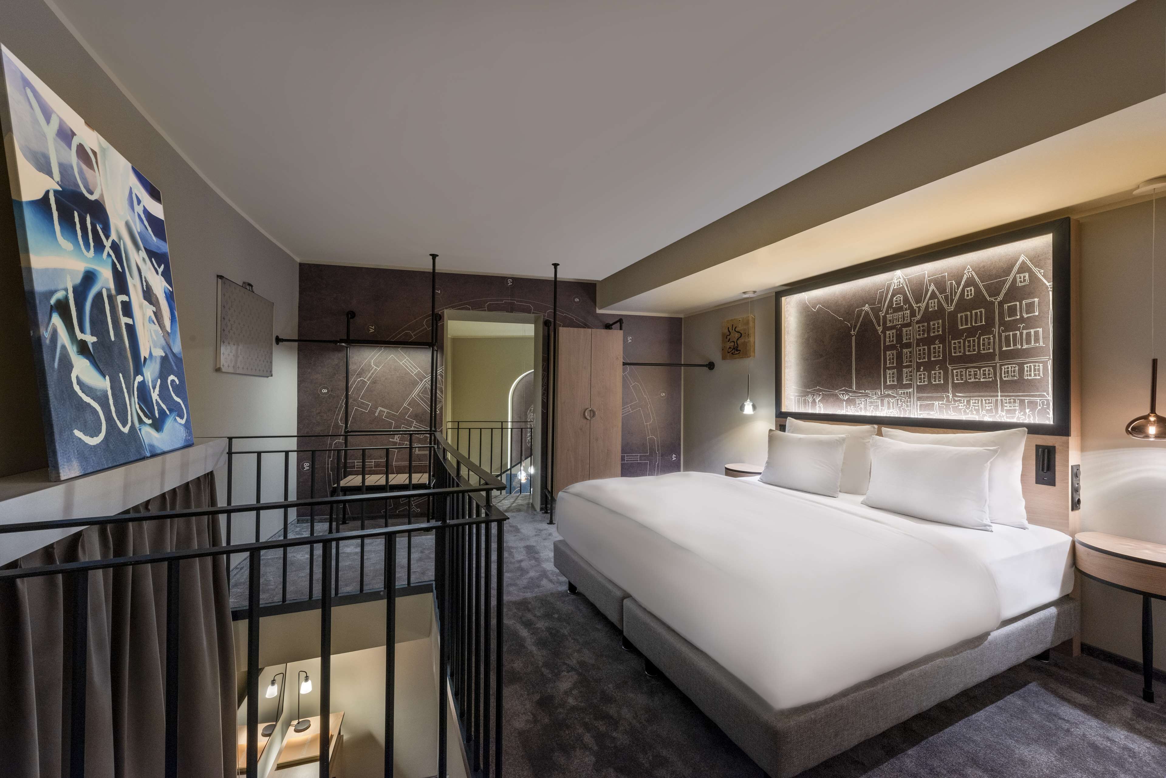 hypo-allergenic bedding, down duvets, minibar, in-room safe