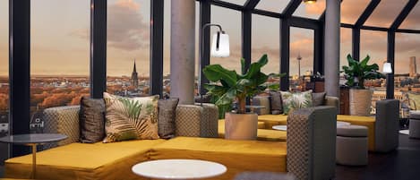 Rooftop bar, garden views, open daily