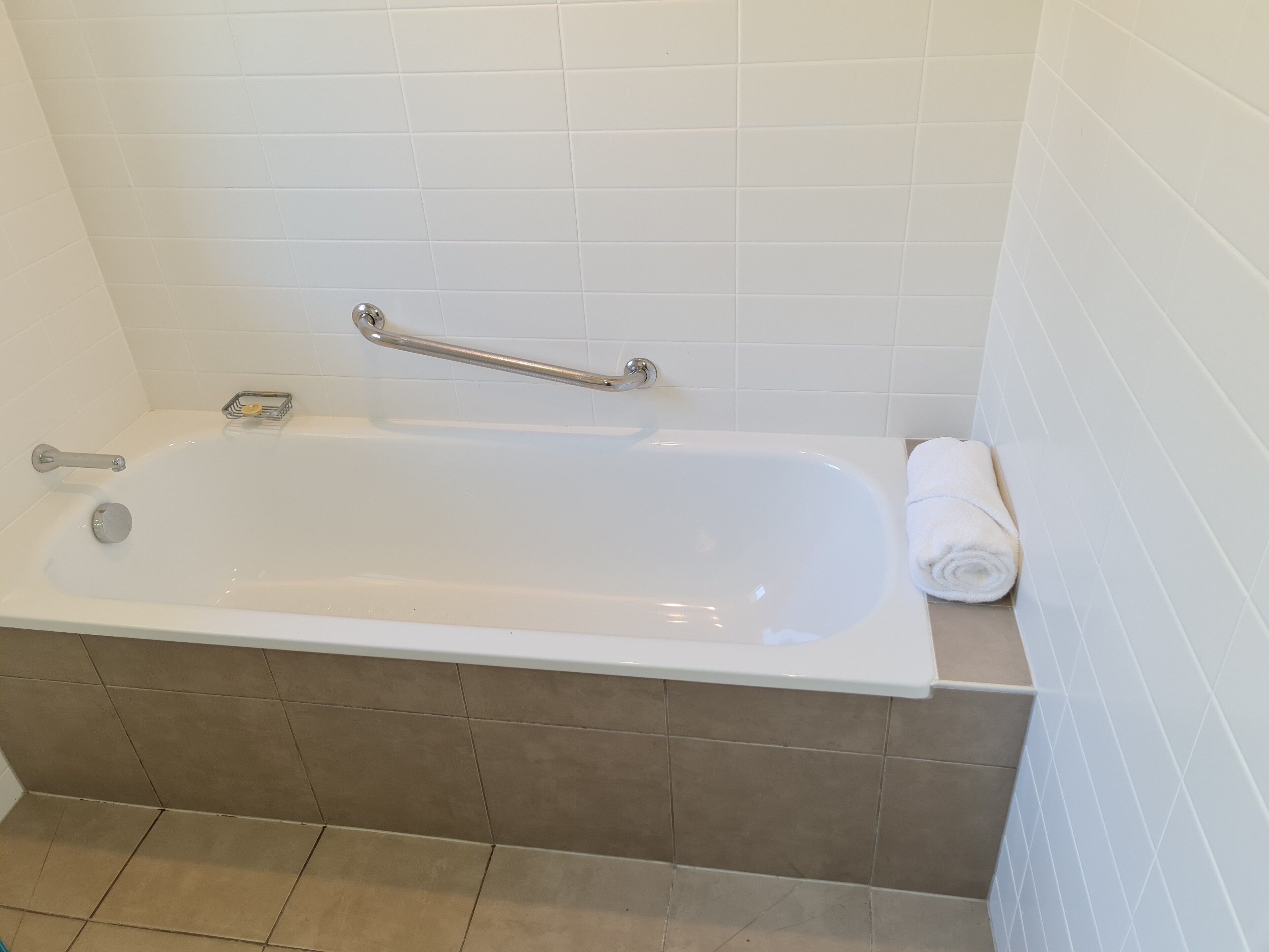 standard room, 1 king bed | bathroom | eco-friendly toiletries, hair dryer, towels