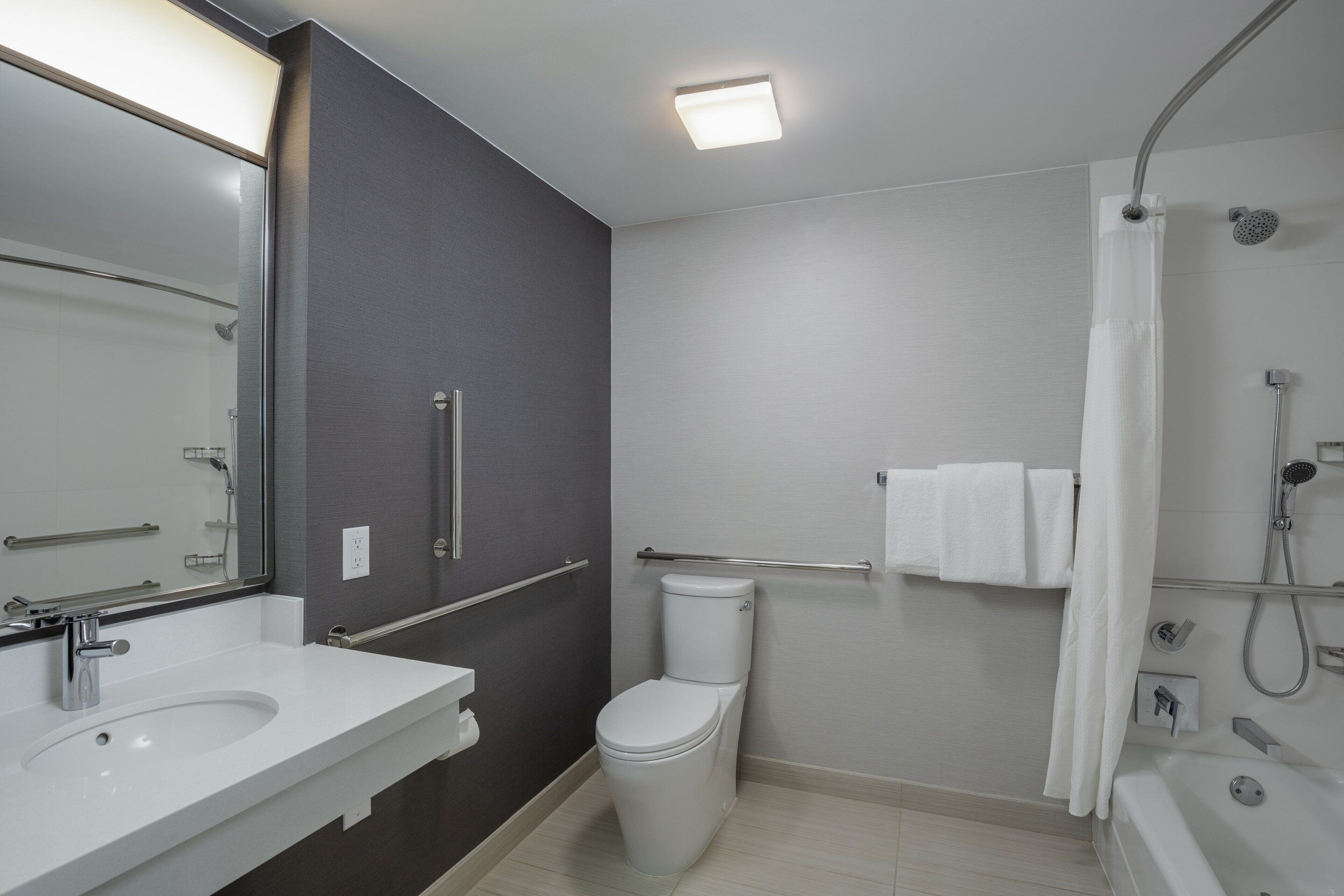 combined shower/bathtub, free toiletries, hair dryer, towels