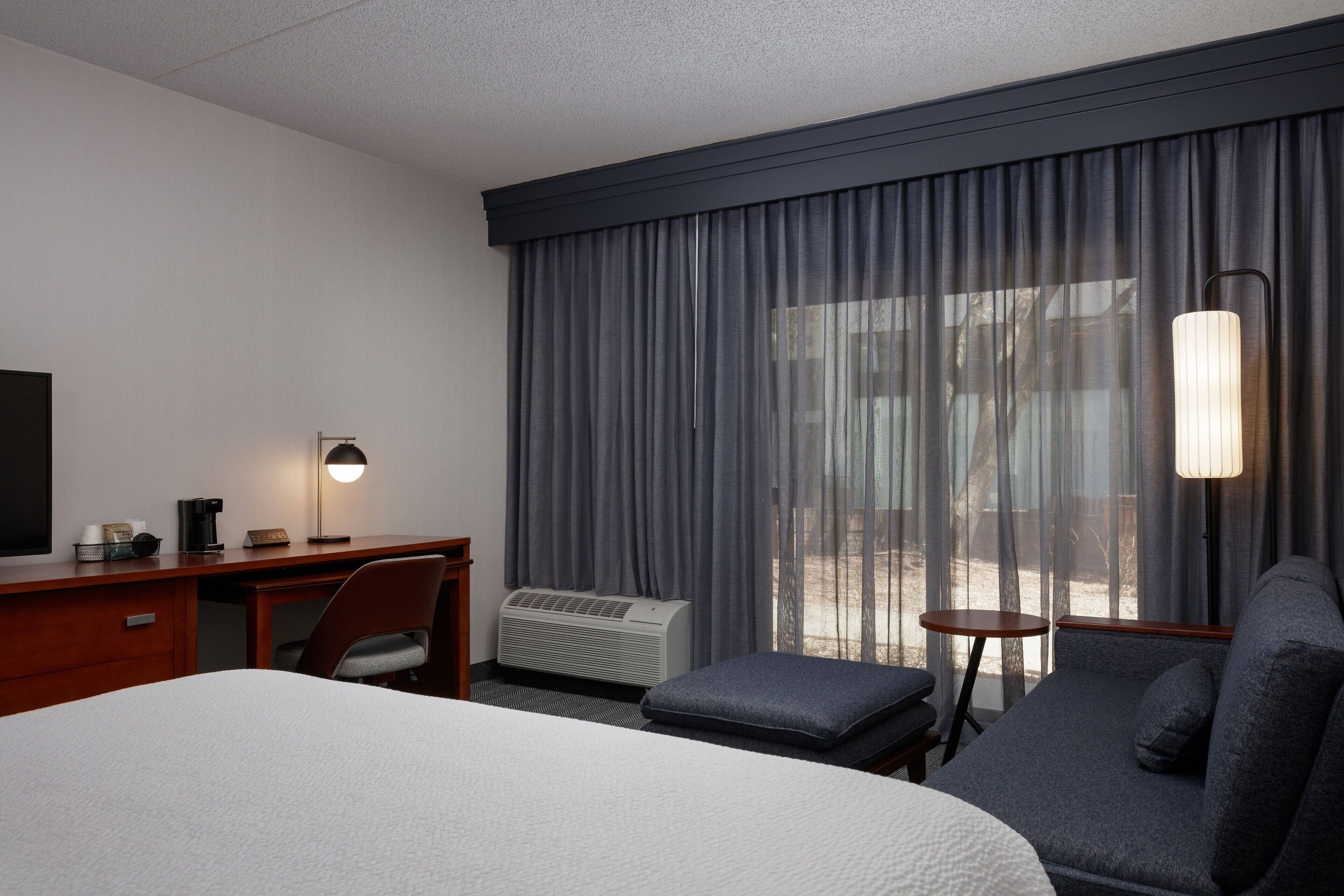 premium bedding, desk, laptop workspace, iron/ironing board