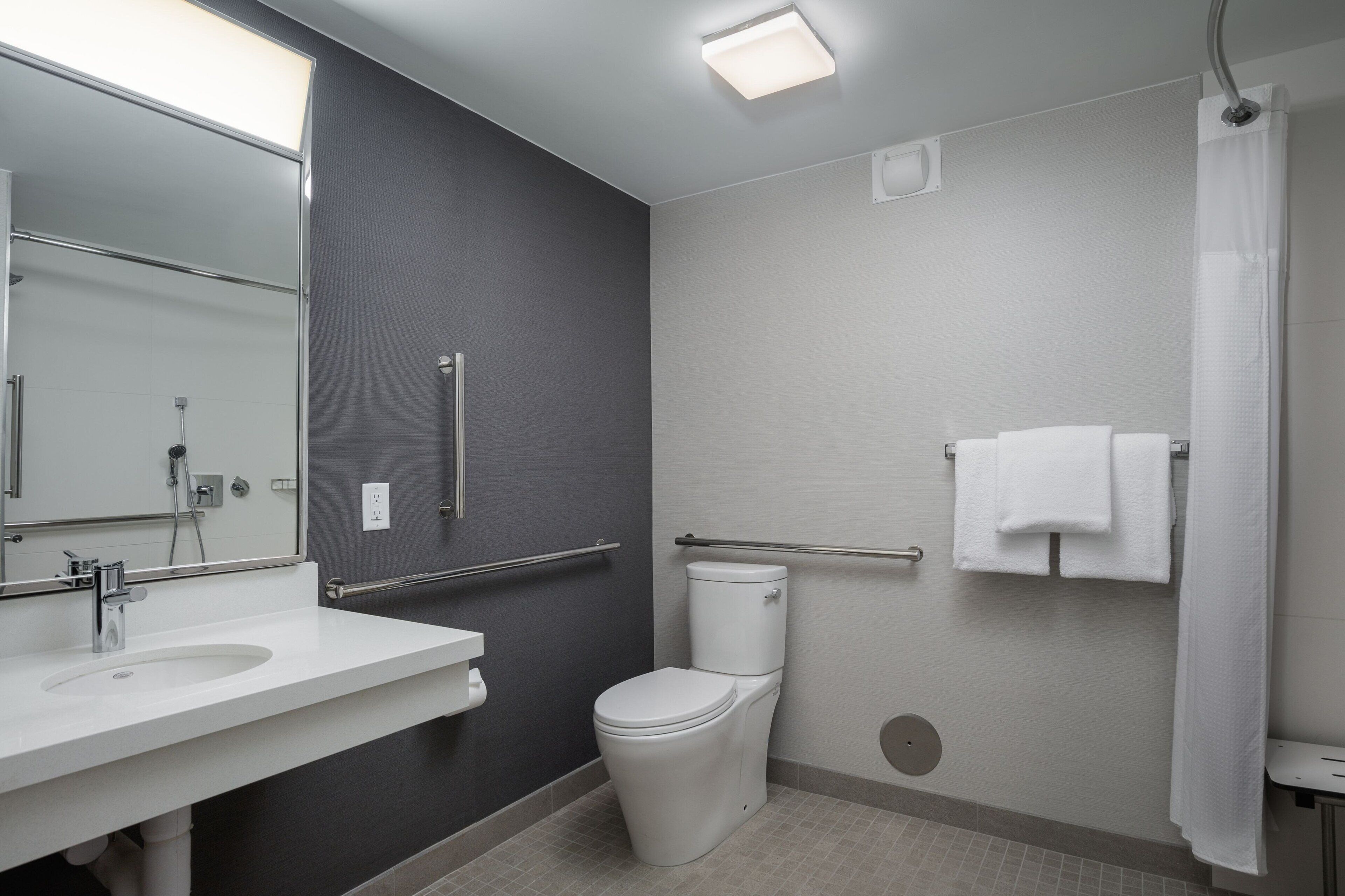 combined shower/bathtub, free toiletries, hair dryer, towels