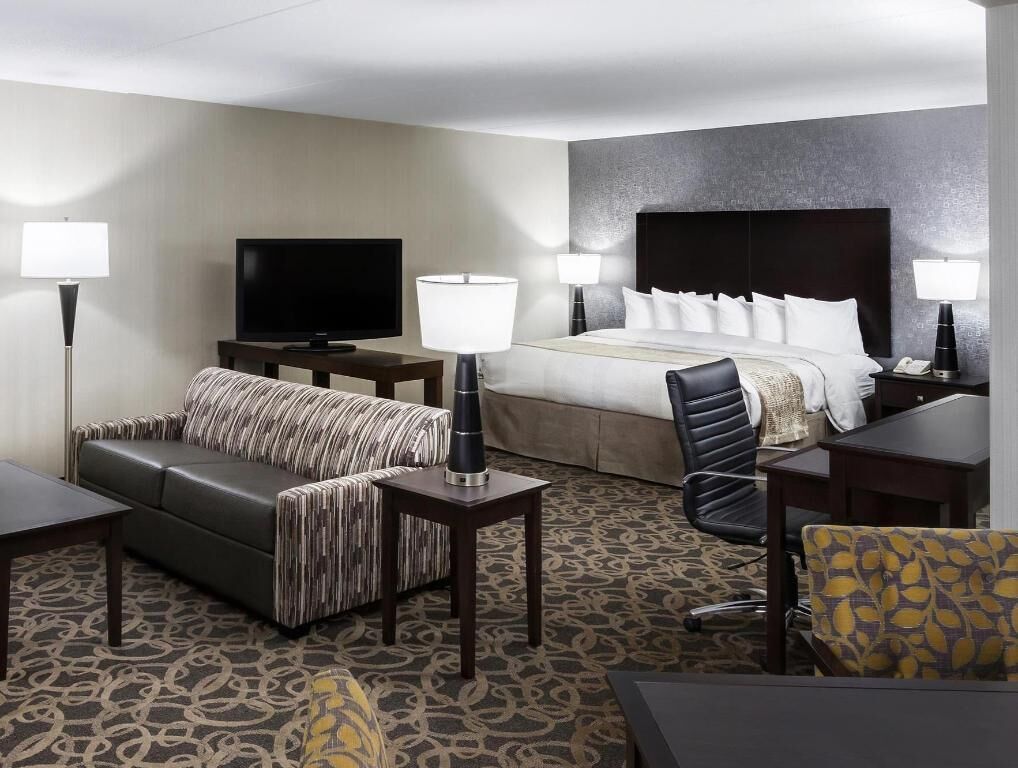 Premium bedding, pillow-top beds, desk, laptop workspace