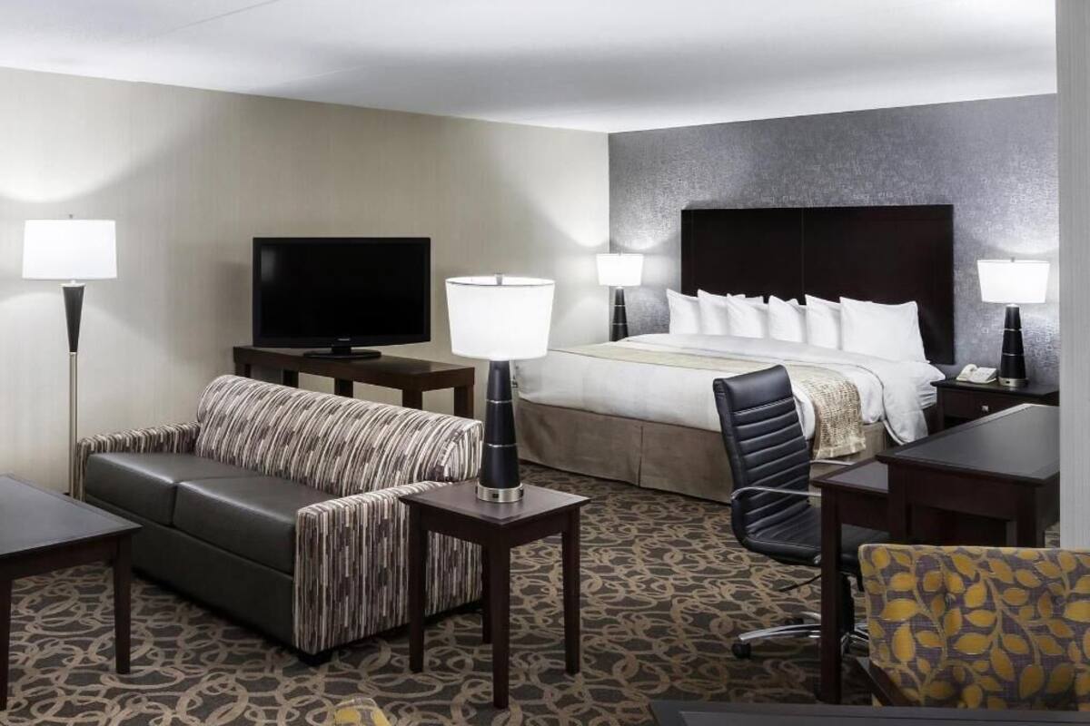 Premium bedding, pillow-top beds, desk, laptop workspace