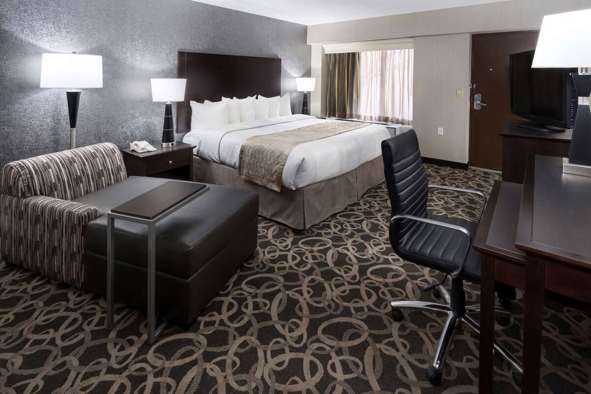 Premium bedding, pillow-top beds, desk, laptop workspace