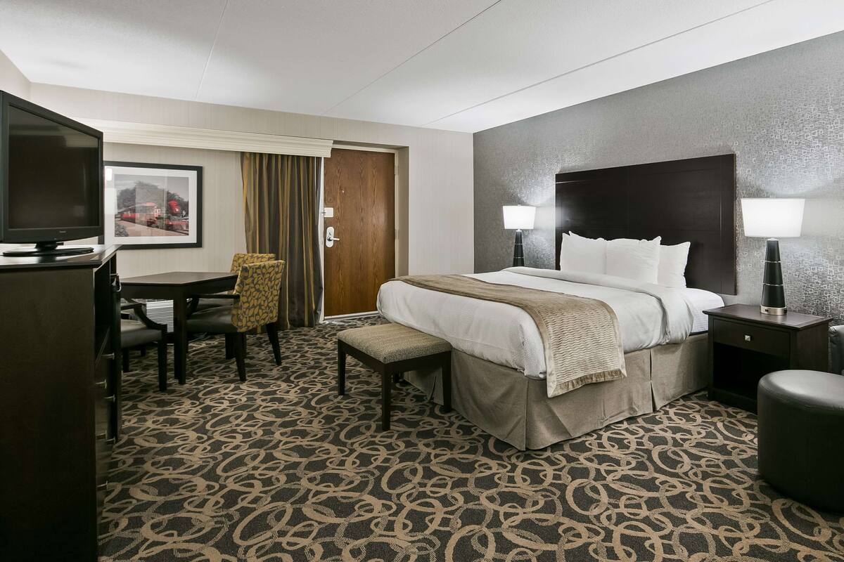 Premium bedding, pillow-top beds, desk, laptop workspace