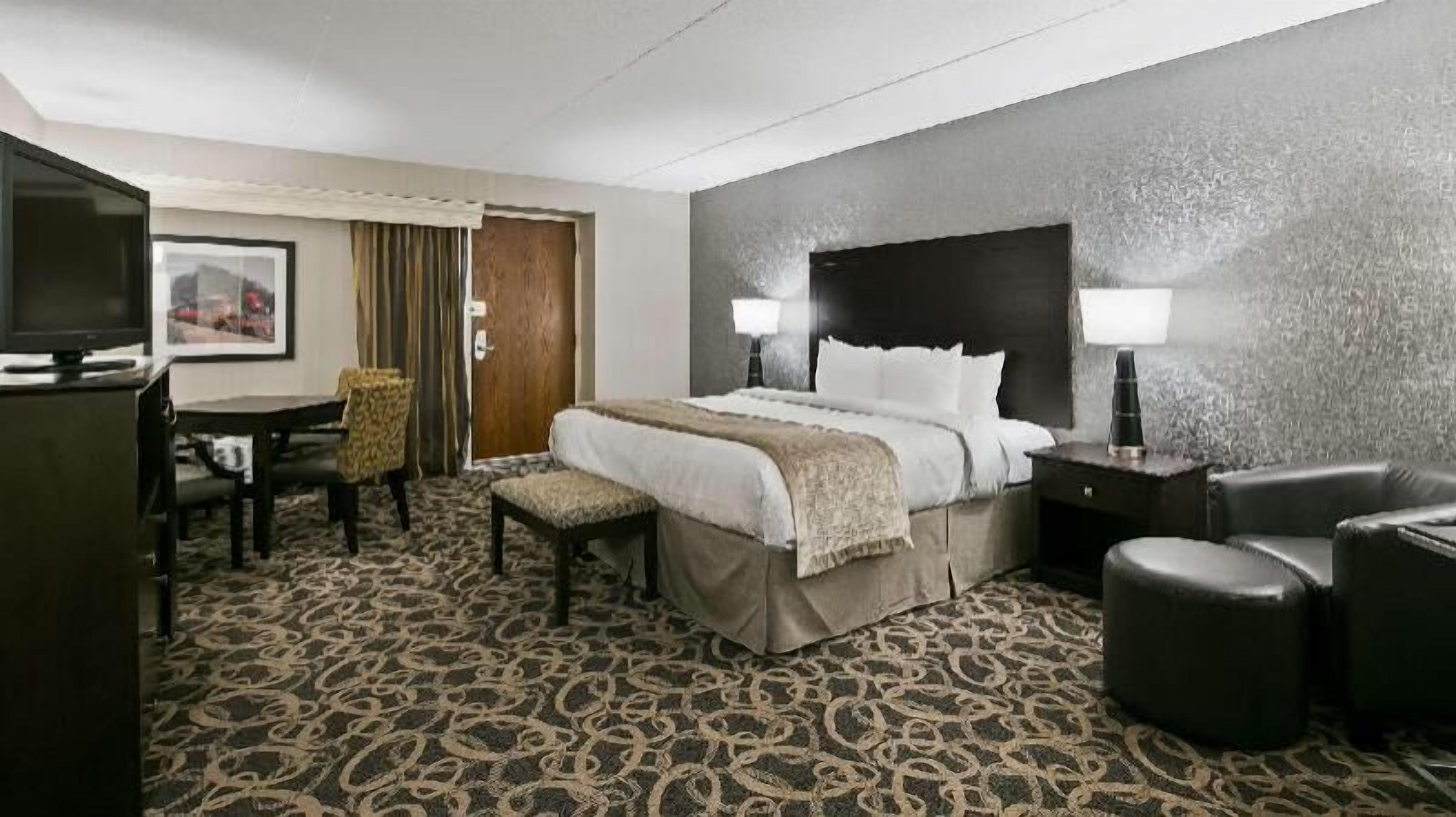 Premium bedding, pillow-top beds, desk, laptop workspace