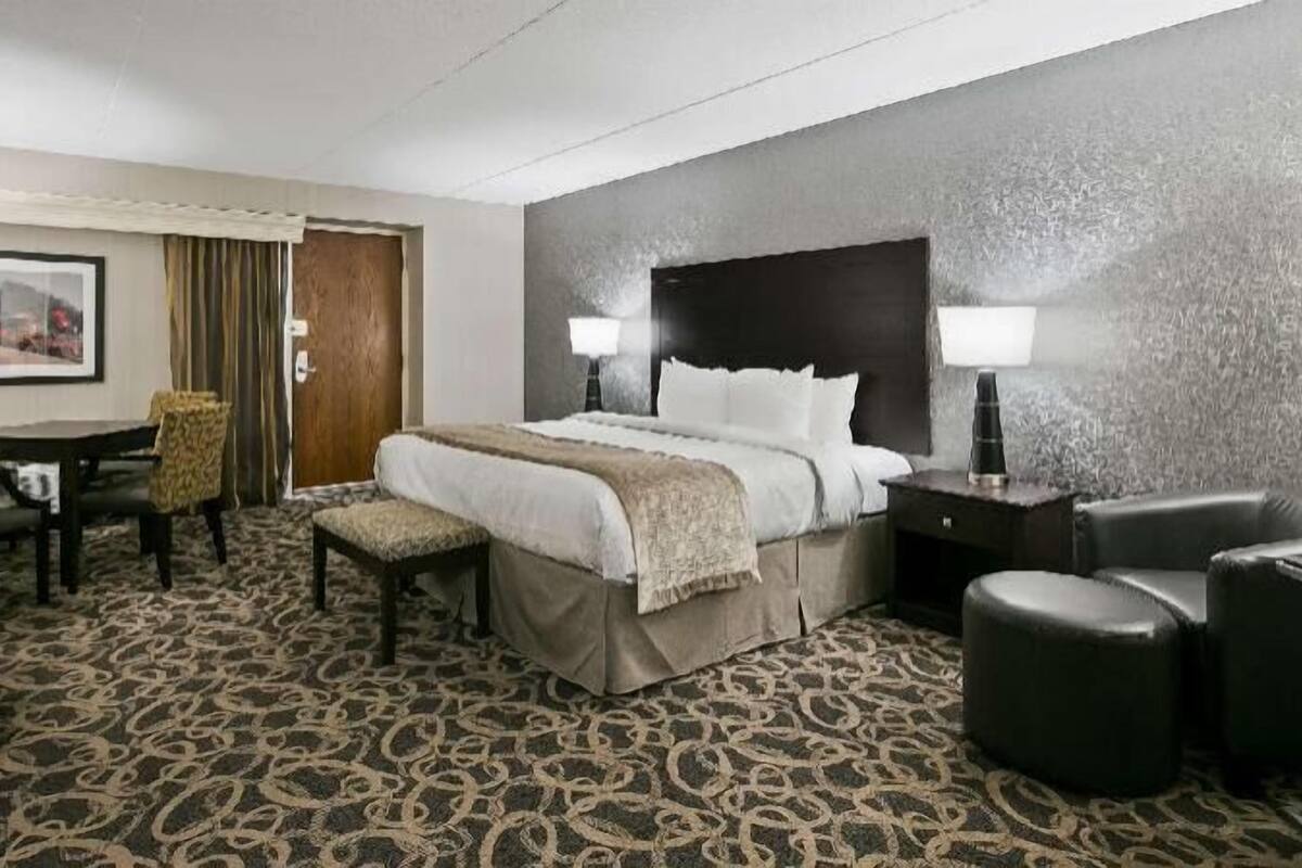 Premium bedding, pillow-top beds, desk, laptop workspace