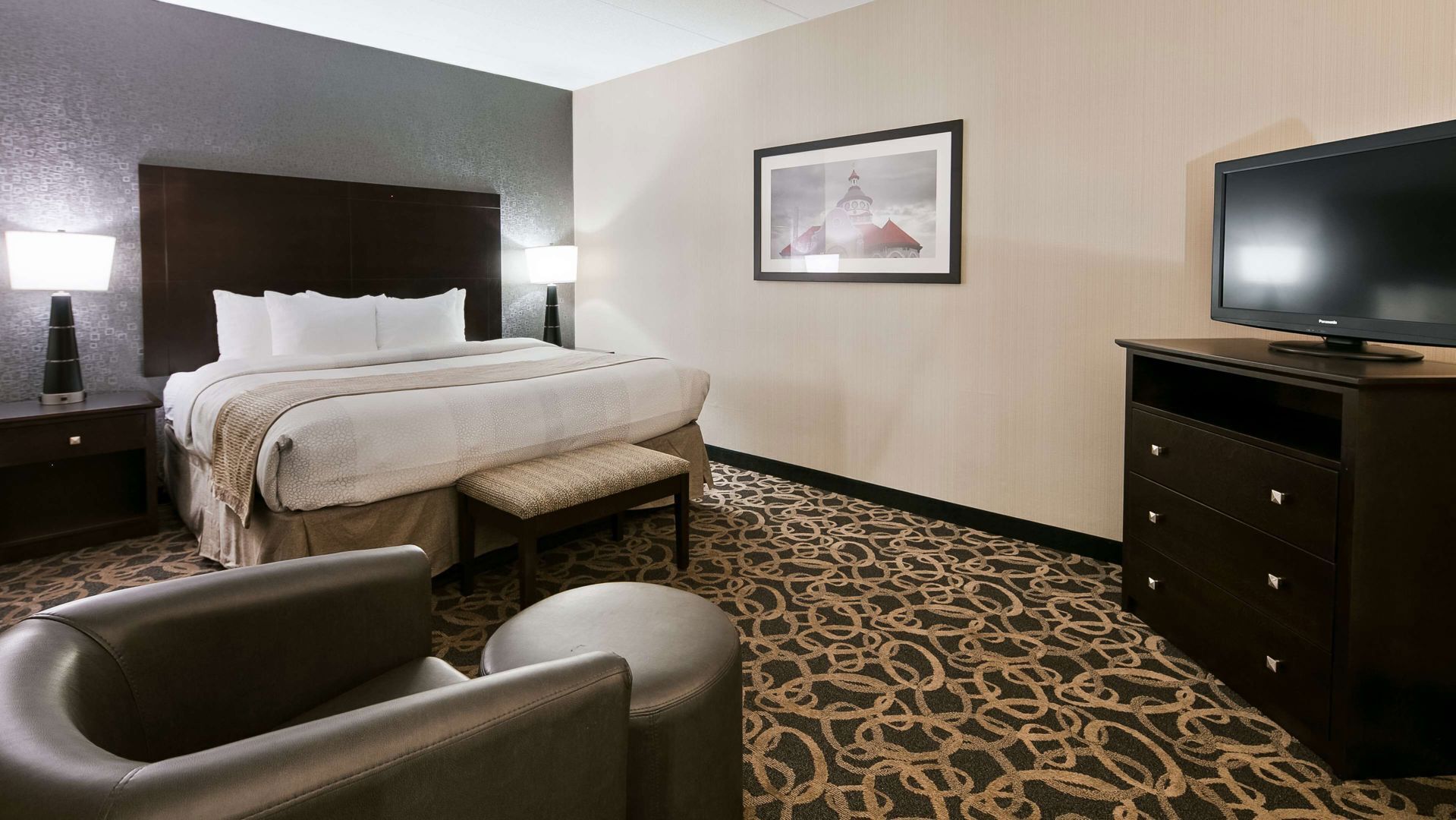 Premium bedding, pillow-top beds, desk, laptop workspace