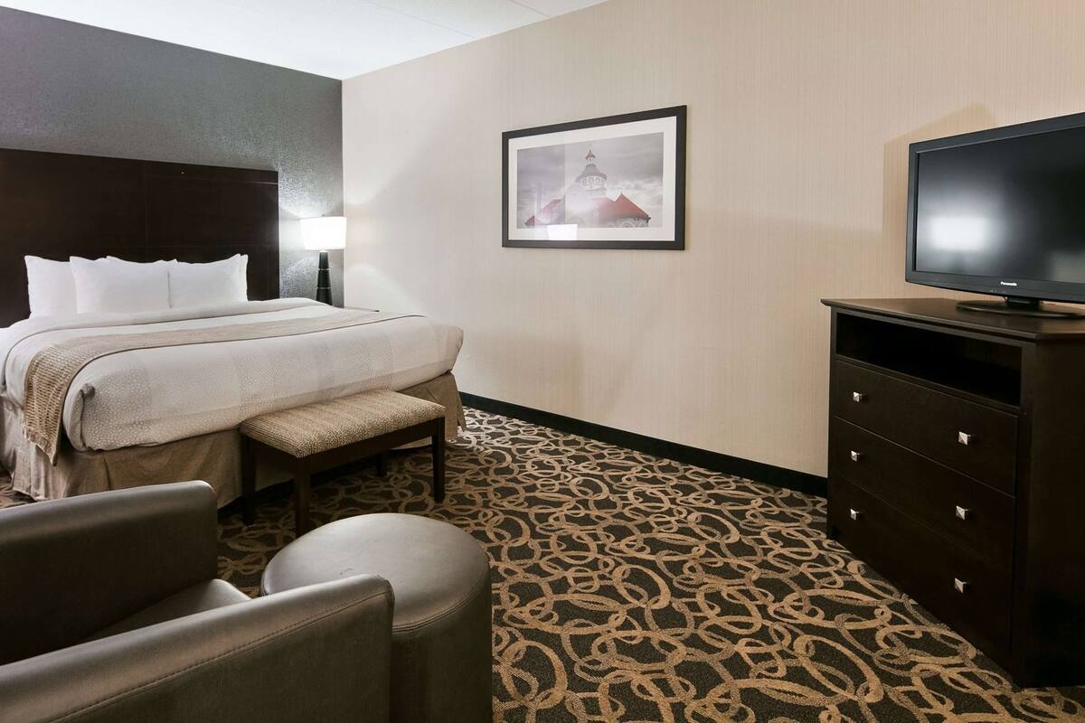 Premium bedding, pillow-top beds, desk, laptop workspace