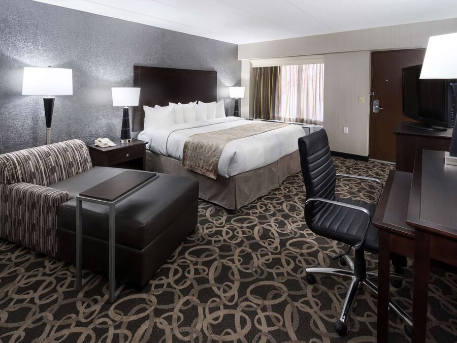 Premium bedding, pillow-top beds, desk, laptop workspace