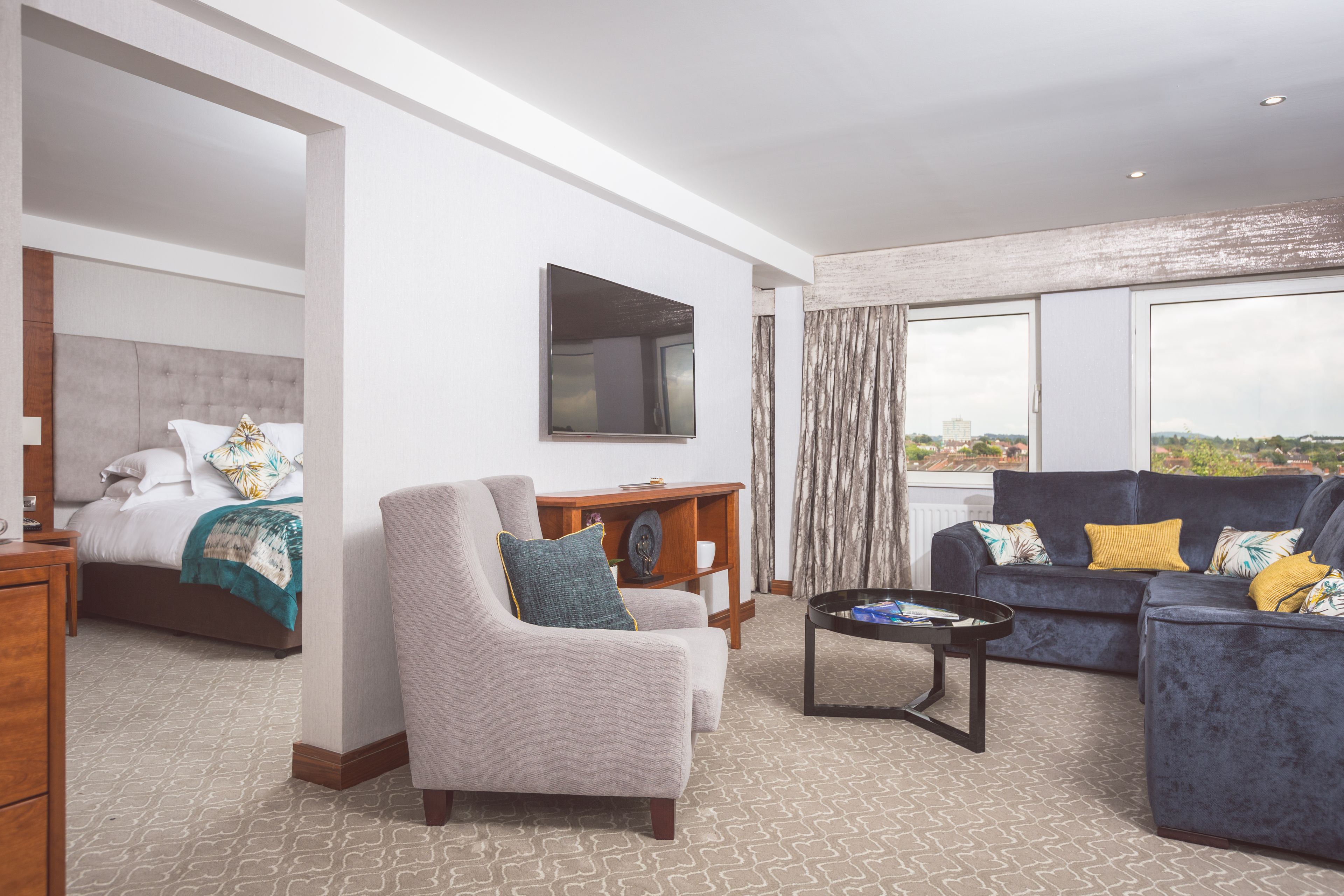 junior suite | in-room safe, desk, laptop workspace, blackout curtains