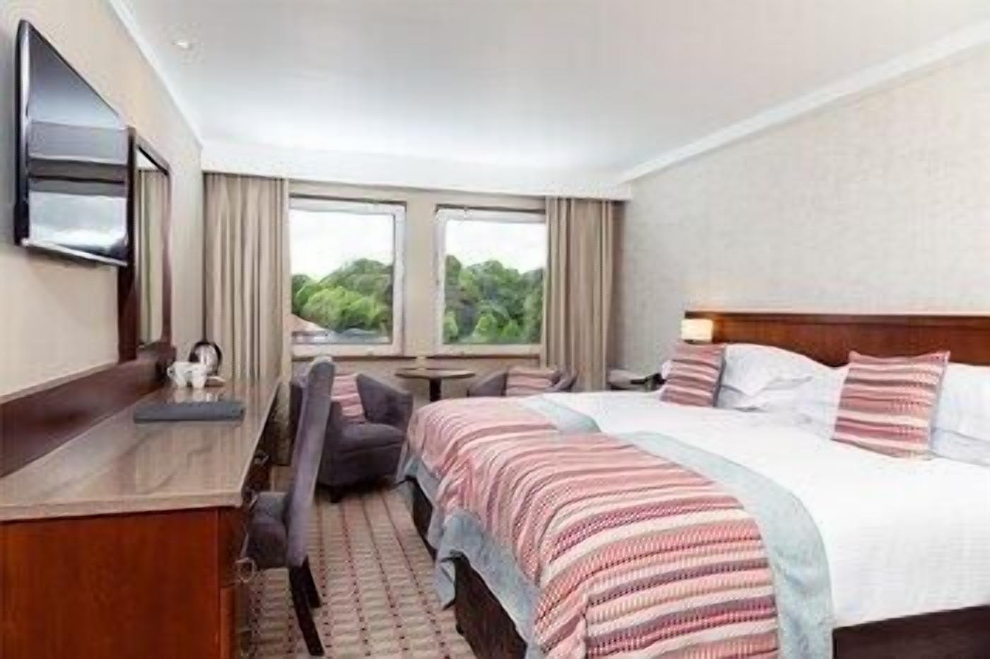 In-room safe, desk, laptop workspace, blackout curtains
