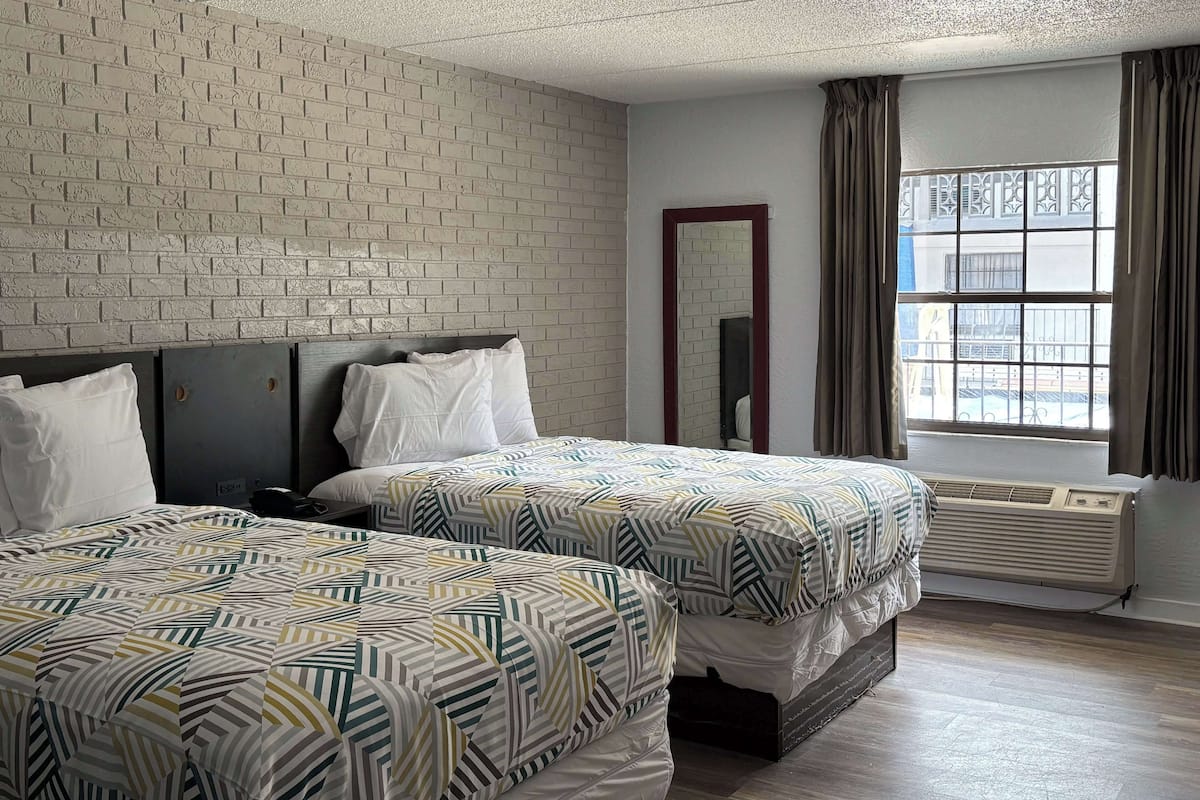 Iron/ironing board, free WiFi, bed sheets, alarm clocks