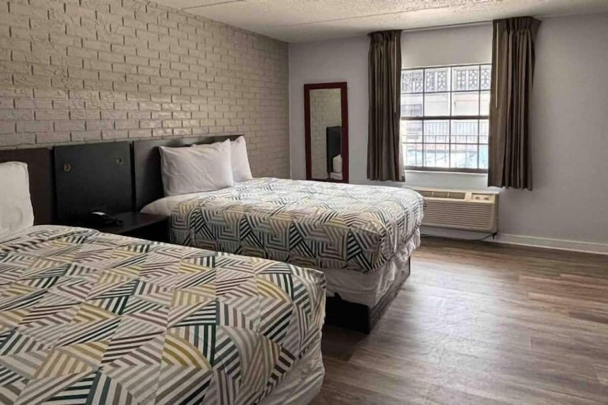 Iron/ironing board, free WiFi, bed sheets, alarm clocks